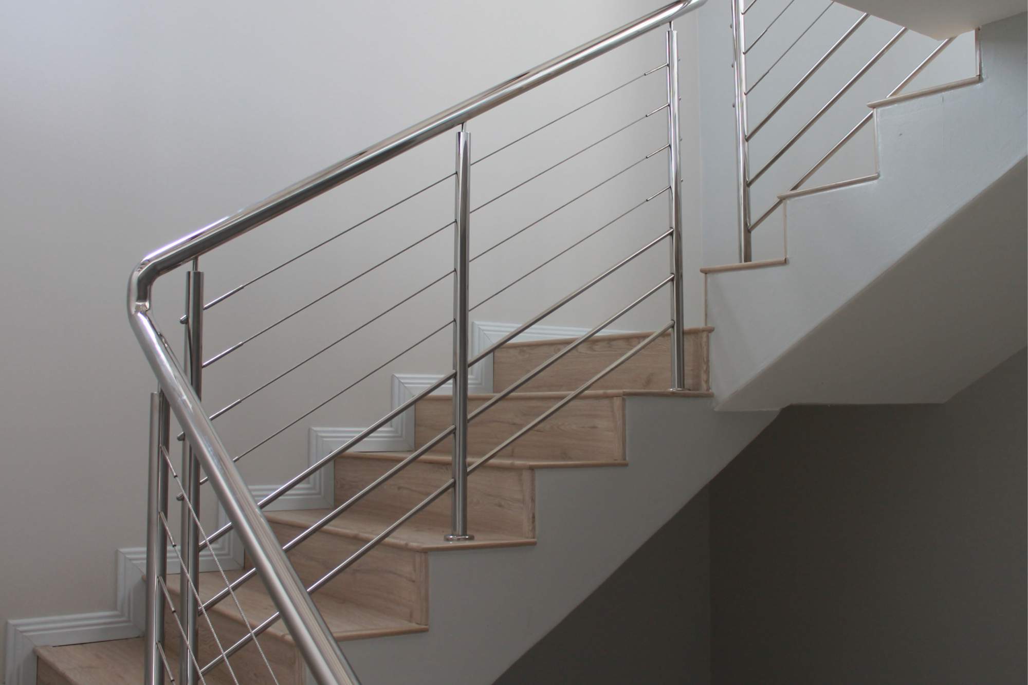 Stainless Steel Balustrade with intermediate rails and cables