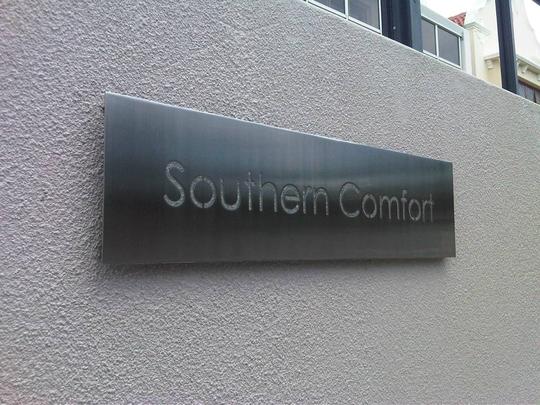 Brushed Stainless steel cut-out plate signage with studs